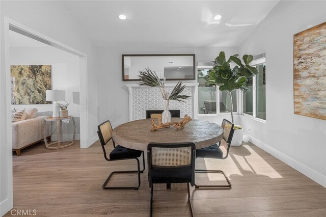 dining space featuring light hardwood / wood-style floors