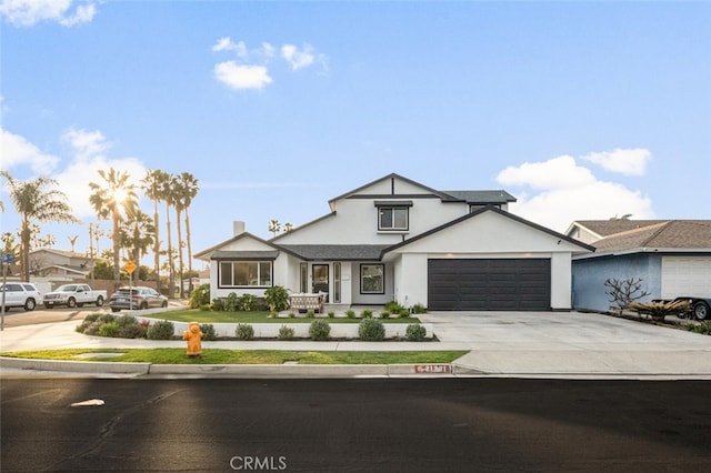 view of front of home with a garage