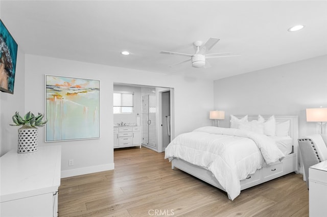 bedroom with ceiling fan and light hardwood / wood-style floors