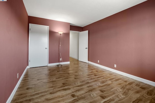 unfurnished bedroom featuring wood-type flooring