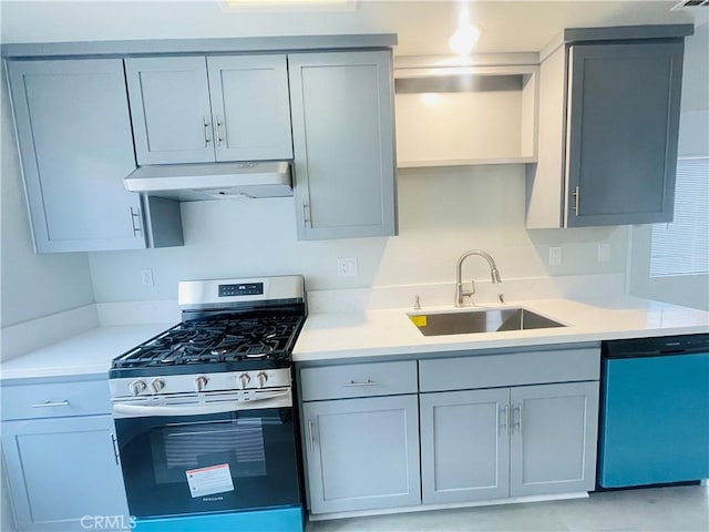 kitchen with stainless steel range with gas cooktop, sink, gray cabinetry, and dishwashing machine