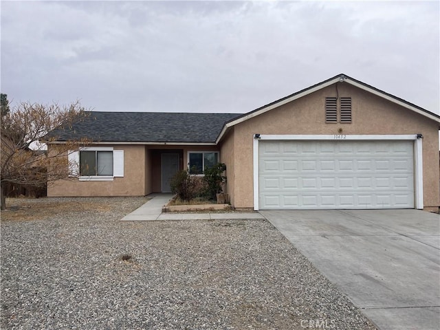 single story home with a garage