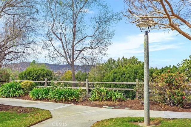 surrounding community with a mountain view