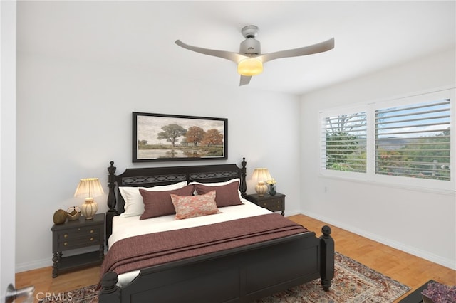 bedroom featuring ceiling fan and light wood-type flooring