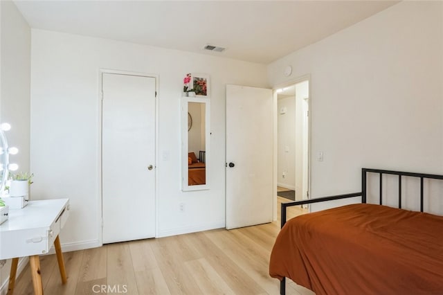 bedroom featuring light wood-type flooring