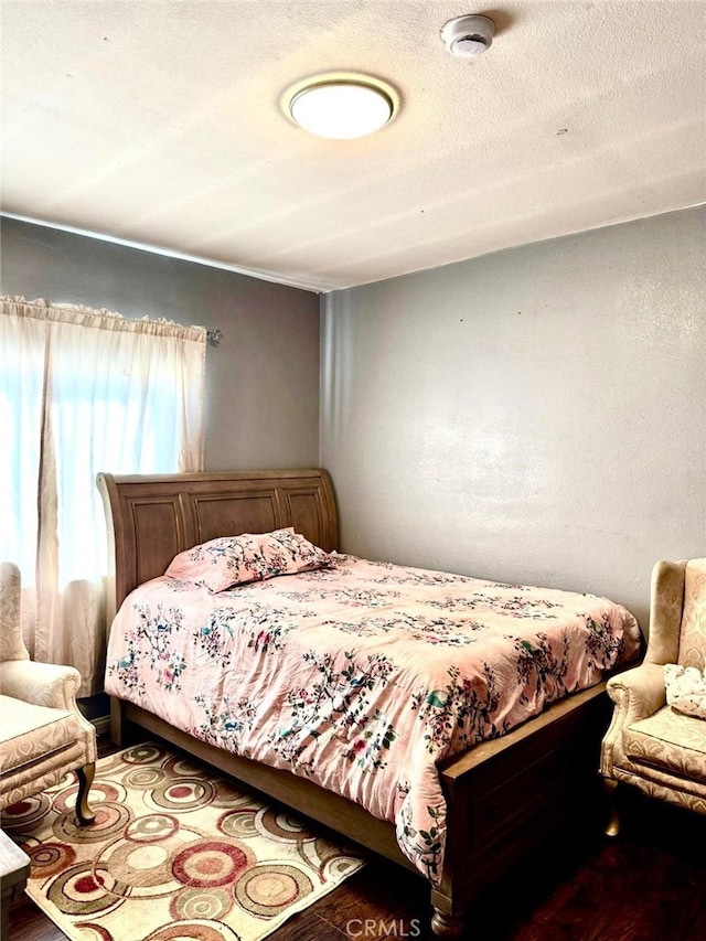 bedroom featuring a textured ceiling