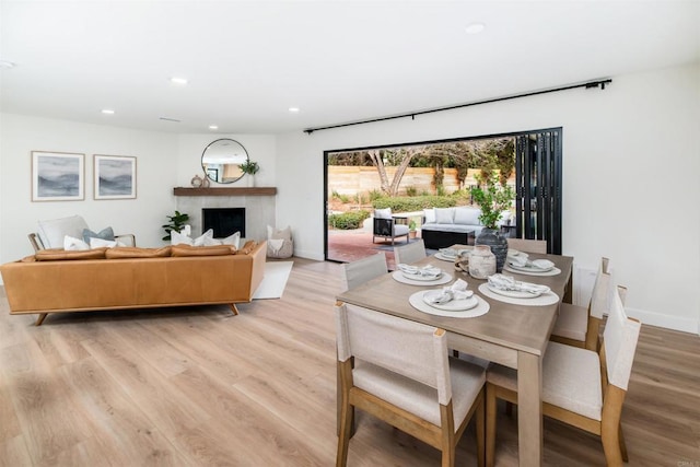 dining room with light hardwood / wood-style floors