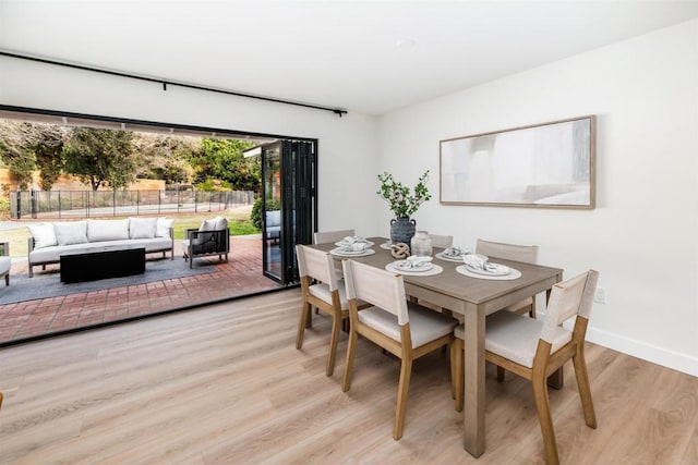 dining area featuring light hardwood / wood-style flooring