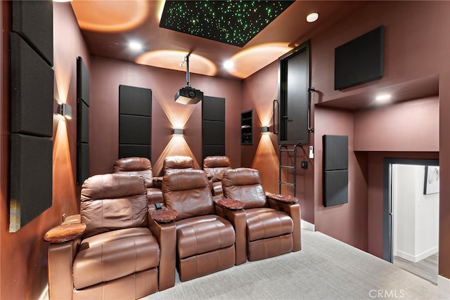 home theater room with light hardwood / wood-style flooring