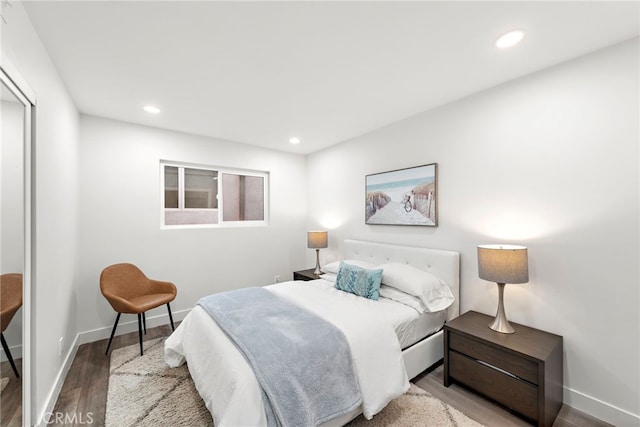 bedroom featuring hardwood / wood-style floors