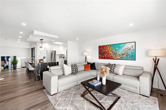 living room with light hardwood / wood-style floors