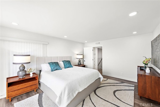 bedroom featuring hardwood / wood-style floors