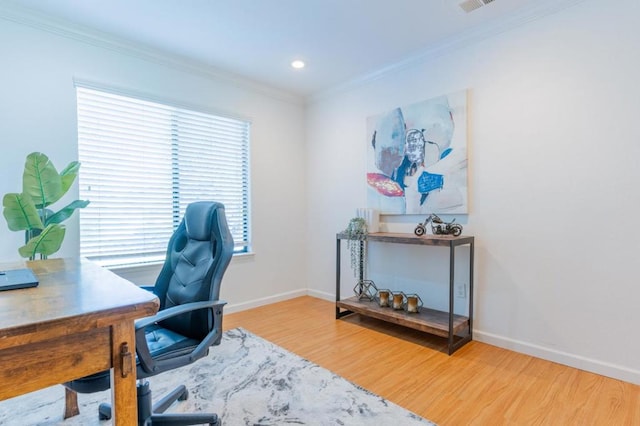 office space featuring wood-type flooring and ornamental molding