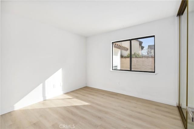 empty room featuring light wood-type flooring