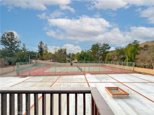 view of sport court with tennis court