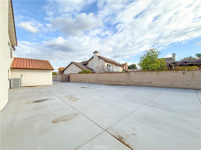 view of patio with central AC