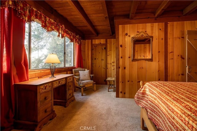 bedroom featuring beamed ceiling, carpet flooring, wooden walls, and wooden ceiling