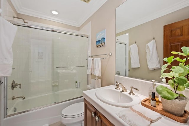 full bathroom with enclosed tub / shower combo, ornamental molding, toilet, and vanity