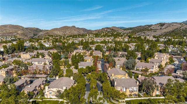 drone / aerial view featuring a mountain view