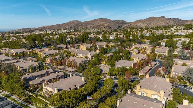 drone / aerial view featuring a mountain view