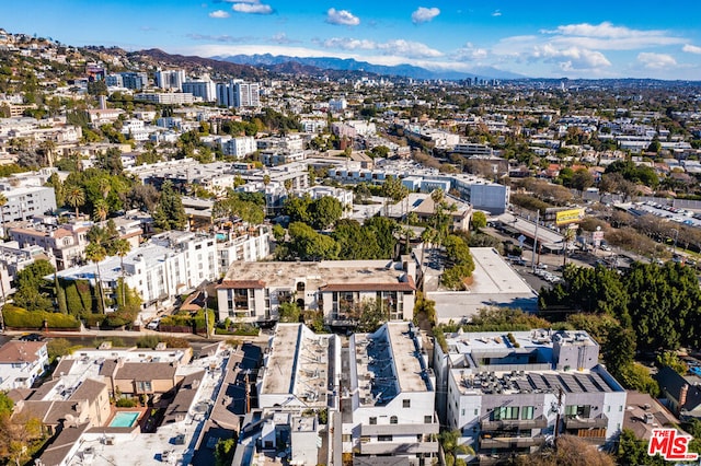 drone / aerial view featuring a mountain view