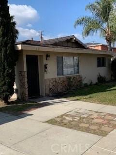 view of front of home with stucco siding