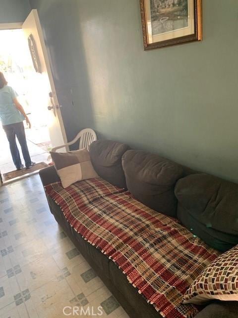 bedroom featuring light floors