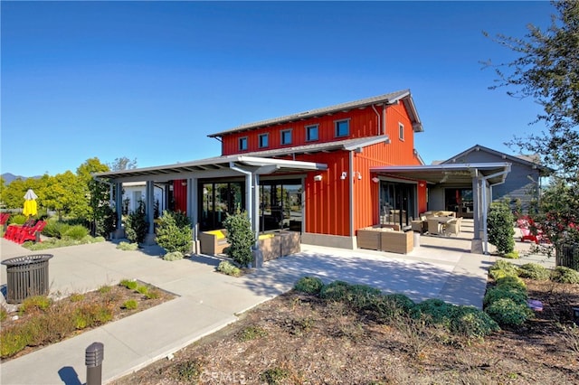 back of house featuring a patio area