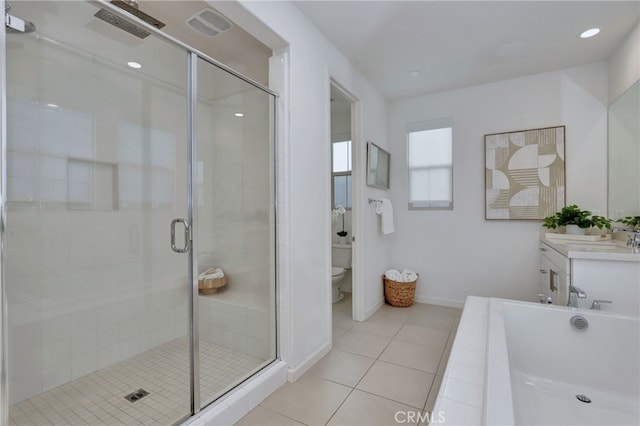 full bathroom with vanity, toilet, independent shower and bath, and tile patterned flooring