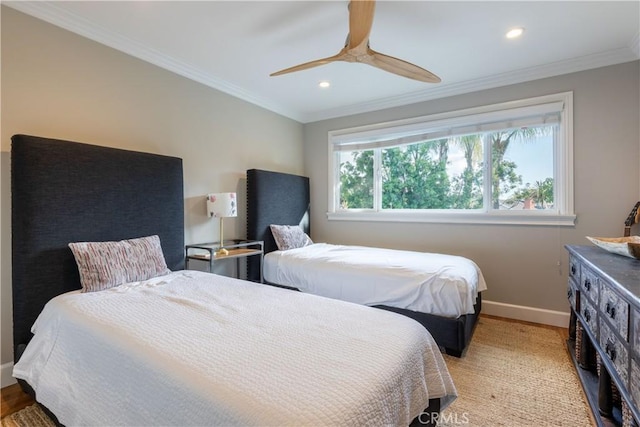 bedroom featuring ornamental molding, light hardwood / wood-style floors, and ceiling fan