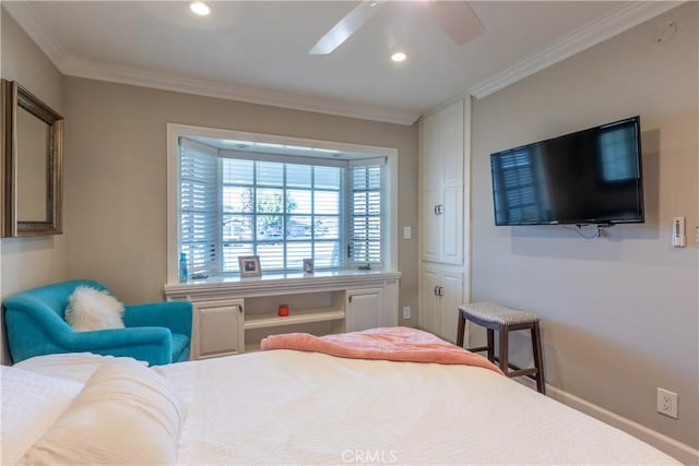 bedroom with ornamental molding and ceiling fan