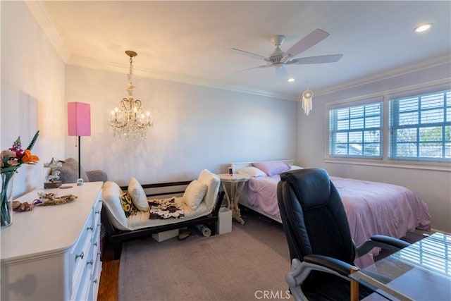 bedroom with crown molding and ceiling fan with notable chandelier