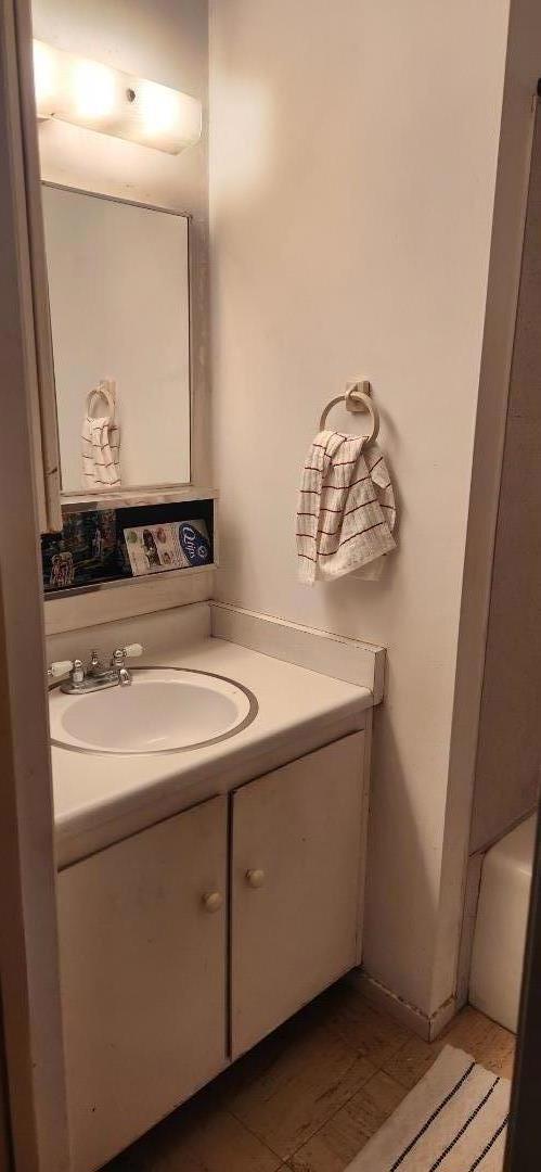 bathroom with vanity and tile patterned floors