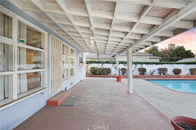 view of swimming pool with a patio area