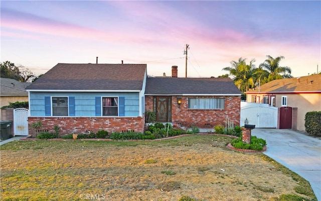 ranch-style house with a yard