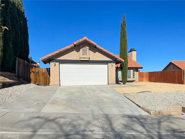 ranch-style home with a garage