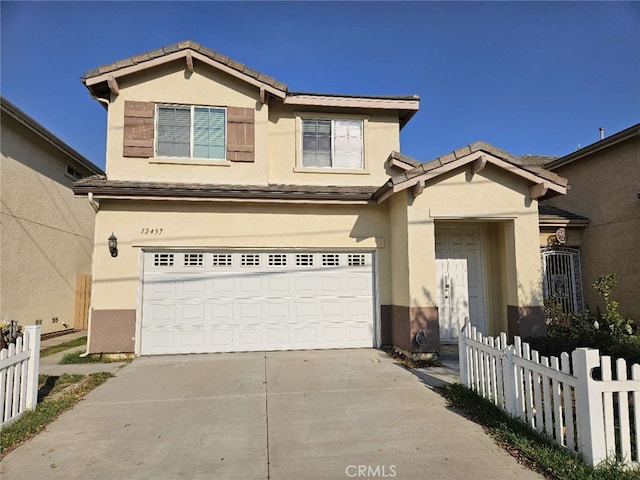 view of front of property with a garage