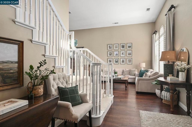 living area featuring dark hardwood / wood-style flooring