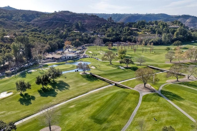 birds eye view of property featuring a mountain view