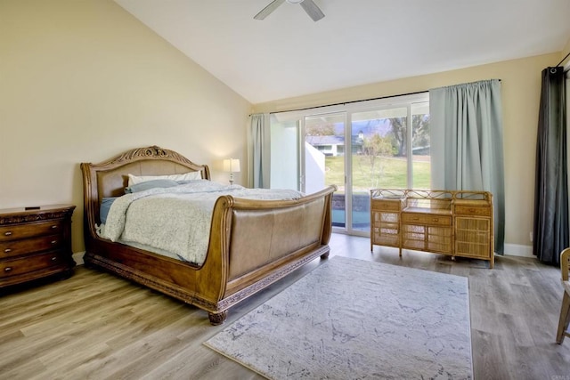 bedroom with lofted ceiling, hardwood / wood-style floors, access to outside, and ceiling fan