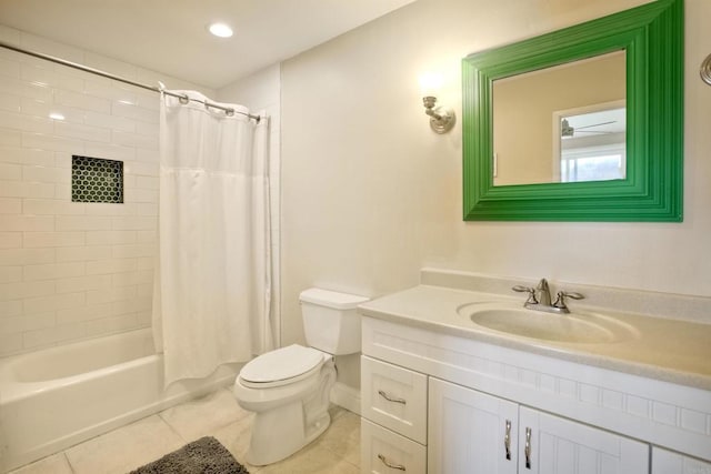 full bathroom with tile patterned flooring, vanity, shower / tub combo, and toilet