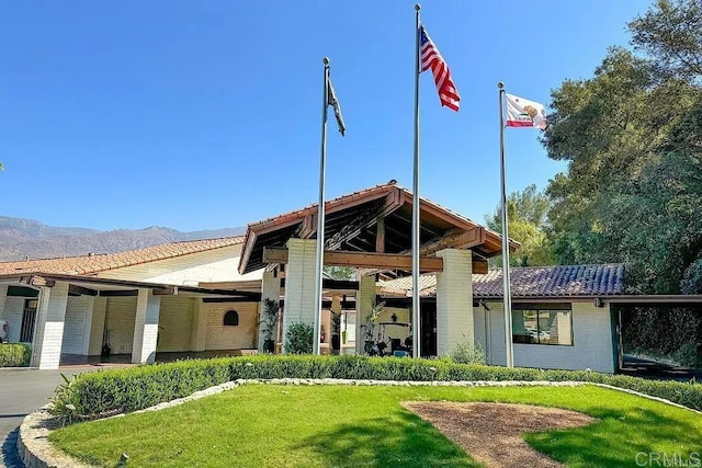 view of building exterior with a mountain view