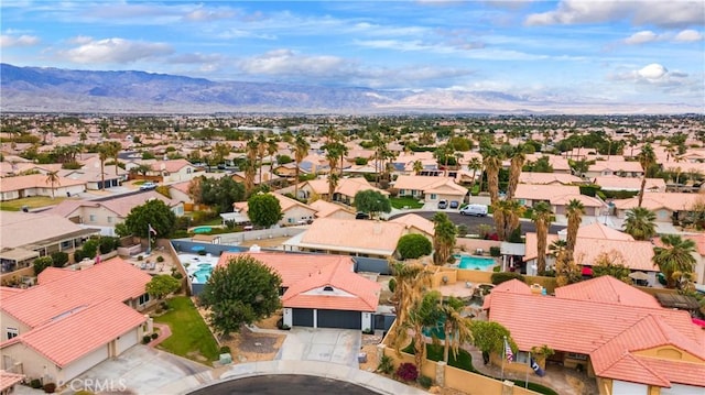 bird's eye view with a mountain view