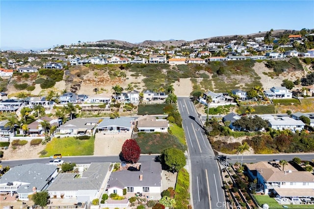 drone / aerial view featuring a mountain view