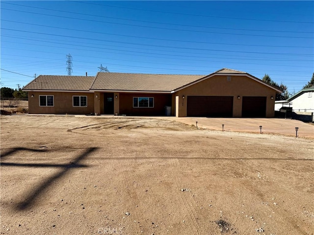 ranch-style home with a garage