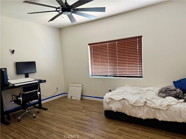 bedroom featuring ceiling fan