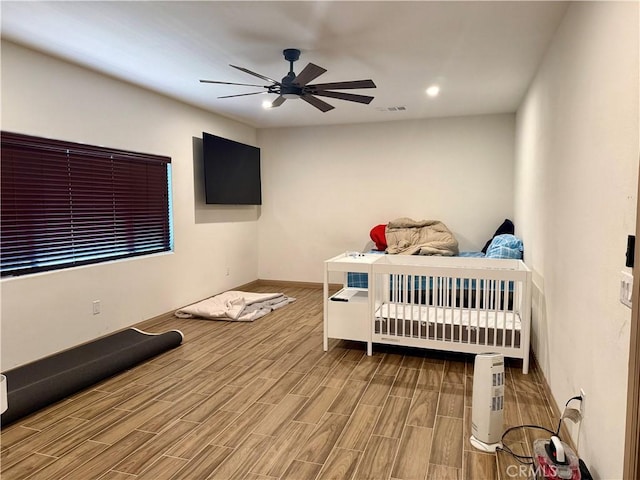 bedroom featuring ceiling fan