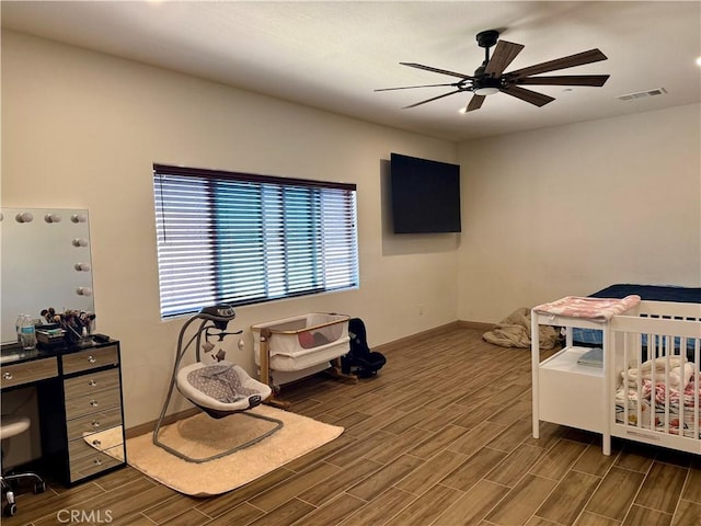 bedroom featuring ceiling fan