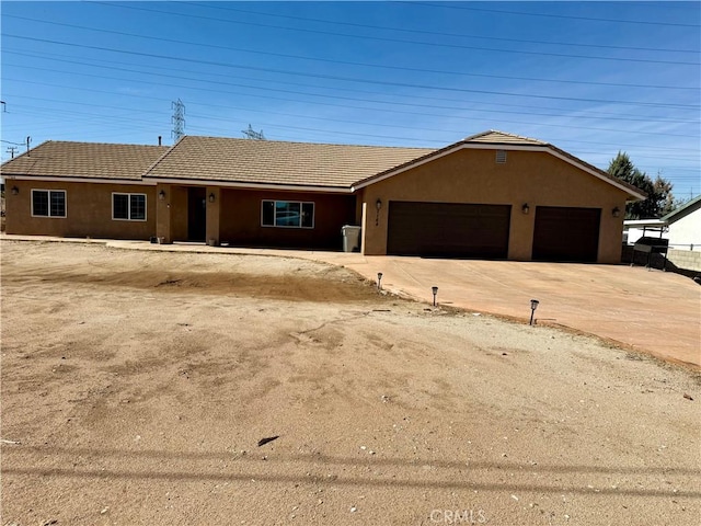 ranch-style house with a garage