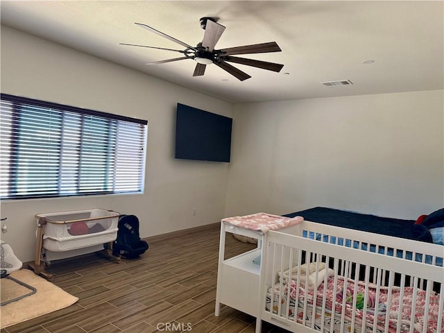 bedroom featuring ceiling fan